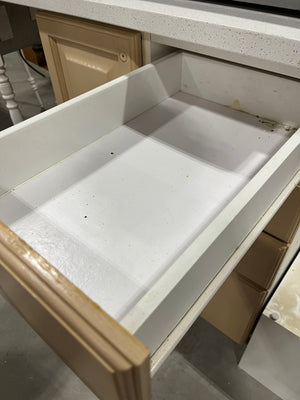 Light Brown Kitchen w/ White Stone Counter & Metal Sink