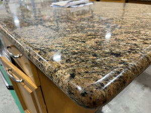 Granite Kitchen with Light Wood Cabinets